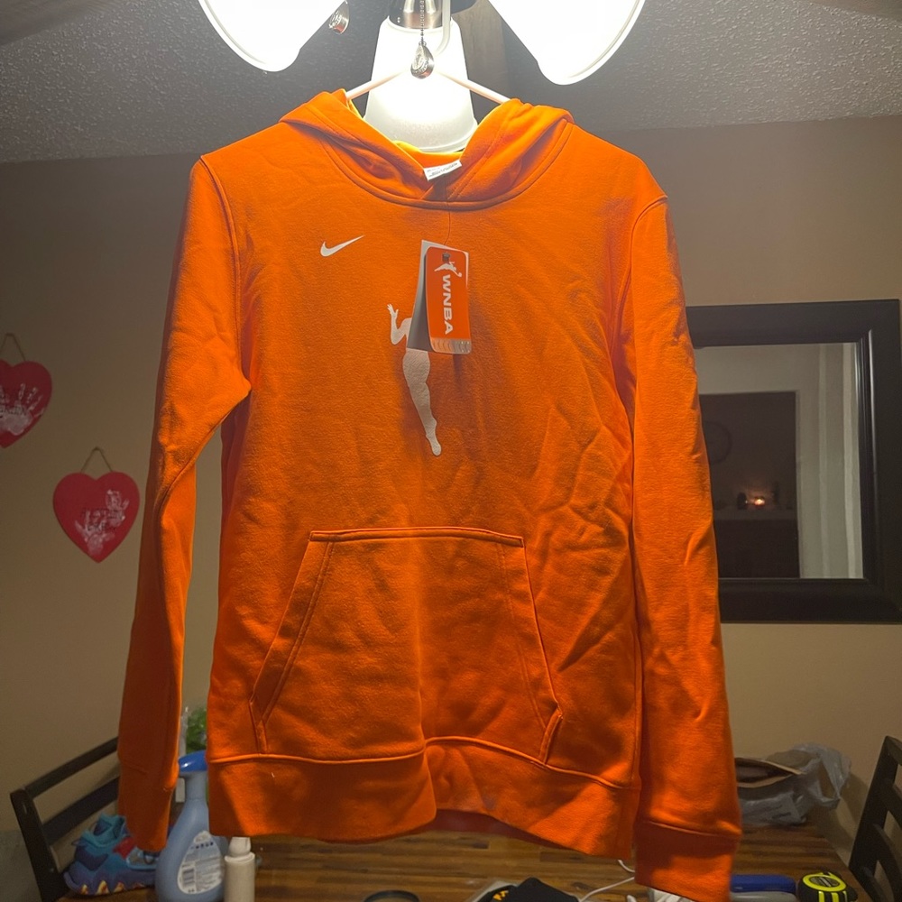 WNBA orange hoodie.New with tags. Never worn